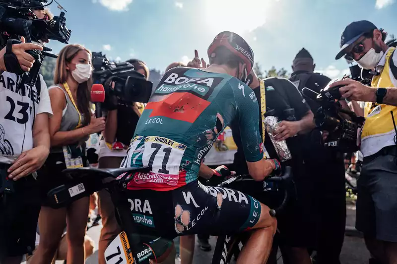 My back hurts" - Hindley crashed on stage 14 of the Tour de France.