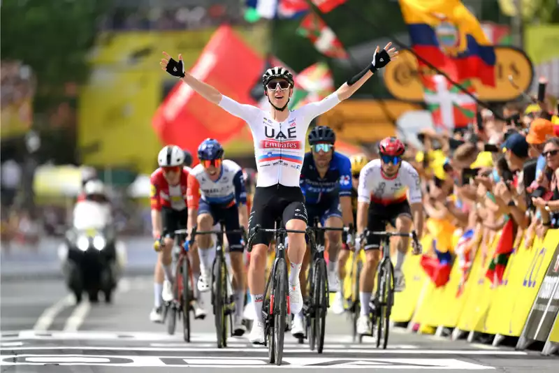 Tadei Pogakar celebrates UAE Team Emirates' success in the Tour de France