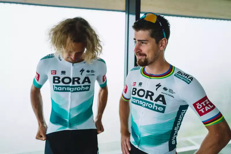 Peter Sagan shows off his new Bora Hansgrohe jersey at the Tour de France.