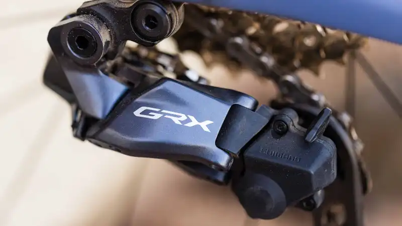 Design Flare: The Shimano GRX Di2 is now 12sp with a flare-optimized hood and satellite shifter